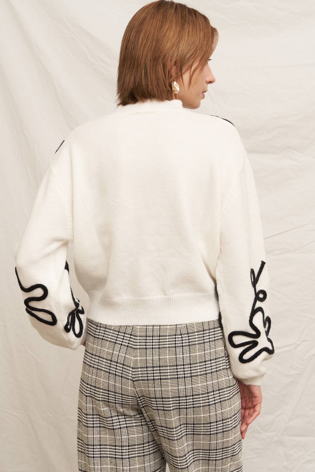 Floral Outline Mock Neck Sweater