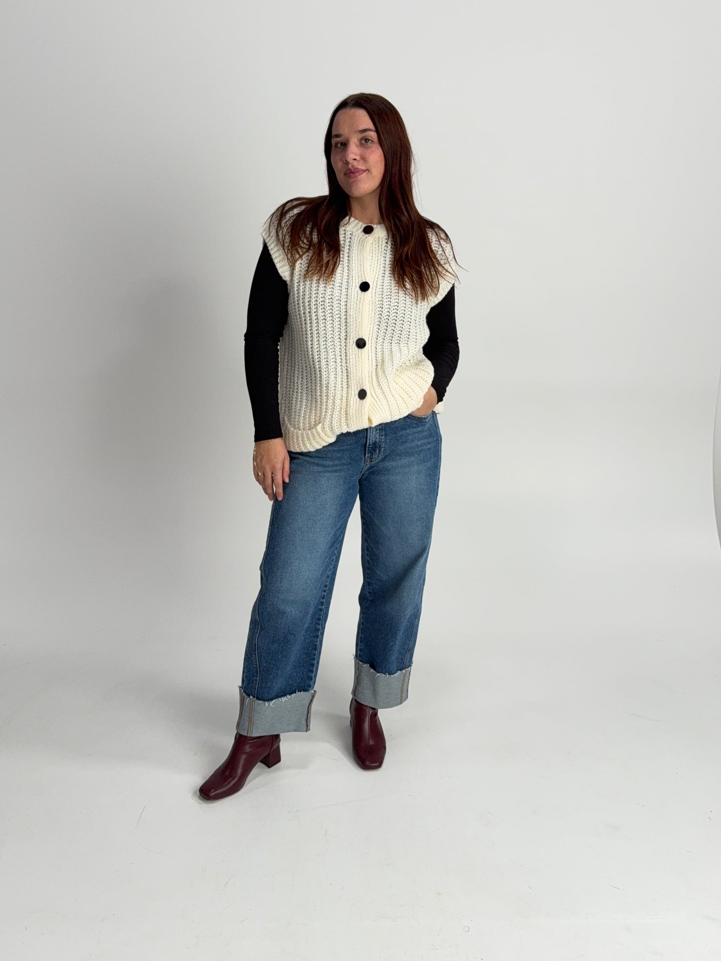 “Textured knit sweater vest layered for fall and holiday outfits — elevated boutique look.”